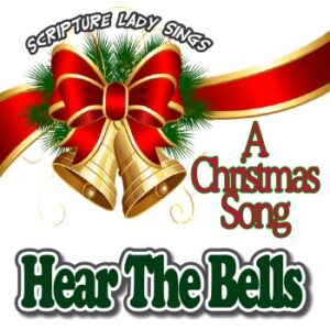 Christmas bells with a festive red ribbon and greenery.