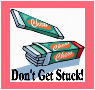 Two gum packs with the text 'Don't Get Stuck!' below them.